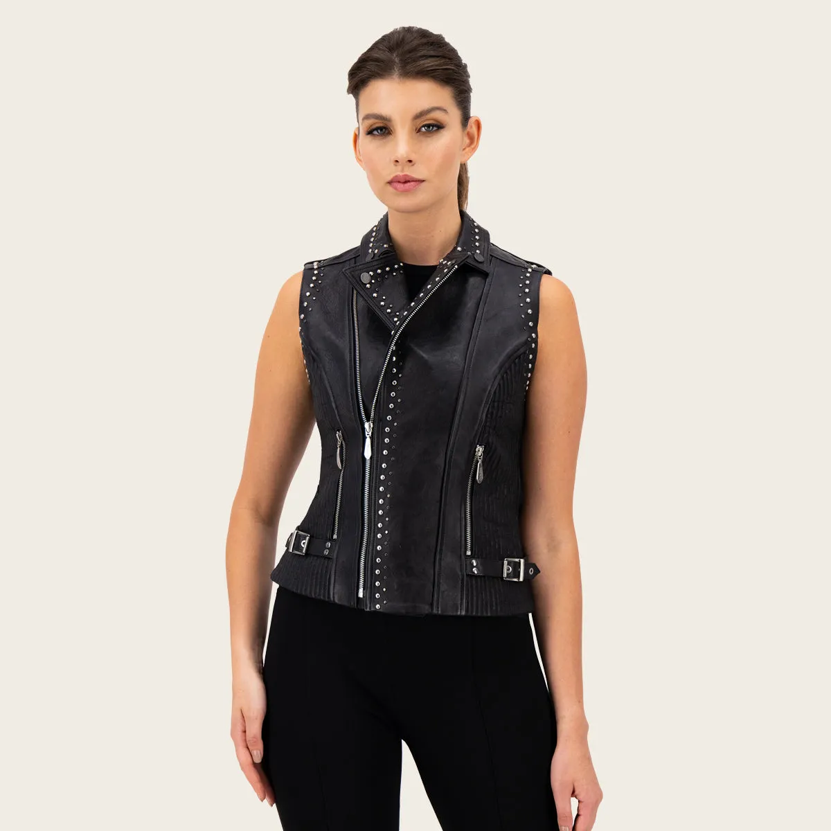 Black biker vest full of studs